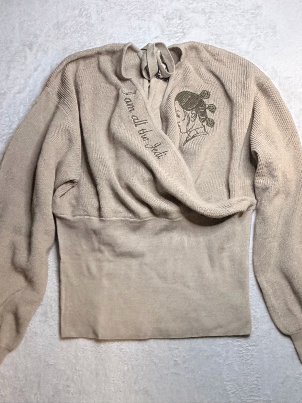 Her Universe Beige Off-the-Shoulder Knit Sweater with Embroidered Portrait